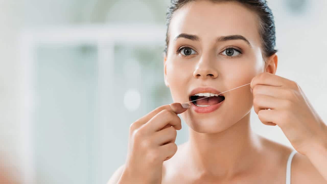 The Link Between Poor Flossing and Gum Disease Salford